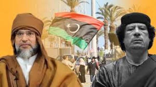 الزعيم الراحل معمر القذافي ونجلهه سيف الاسلام 