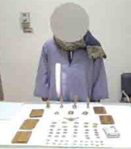 ضبط 4 تماثيل وعملات وأوراق أثرية في محطة سوهاج