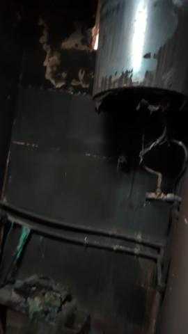 بالصور.. السيطرة على حريق منزل بحلوان