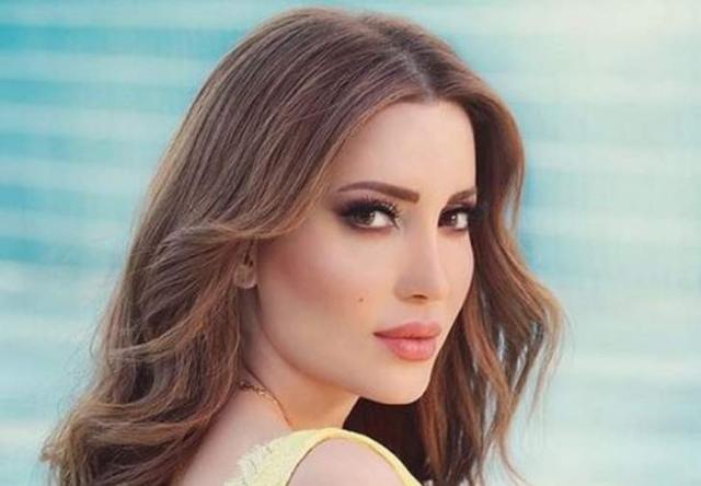 بالأحمر نسرين طافش تطل على جمهورها