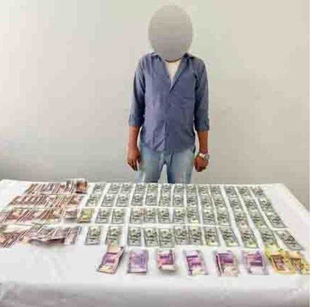 ضبط أجنبي لقيامه بالاتجار غير المشروع في النقد الأجنبي بالقاهرة