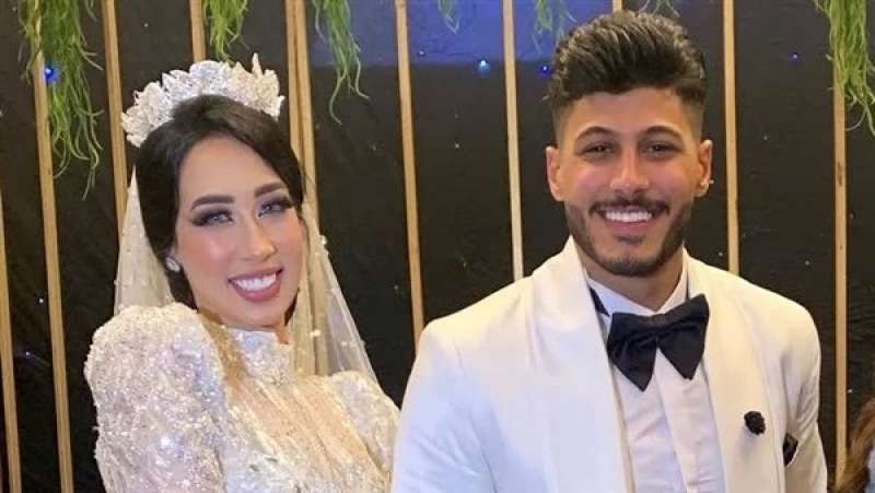 امال مع زوجها