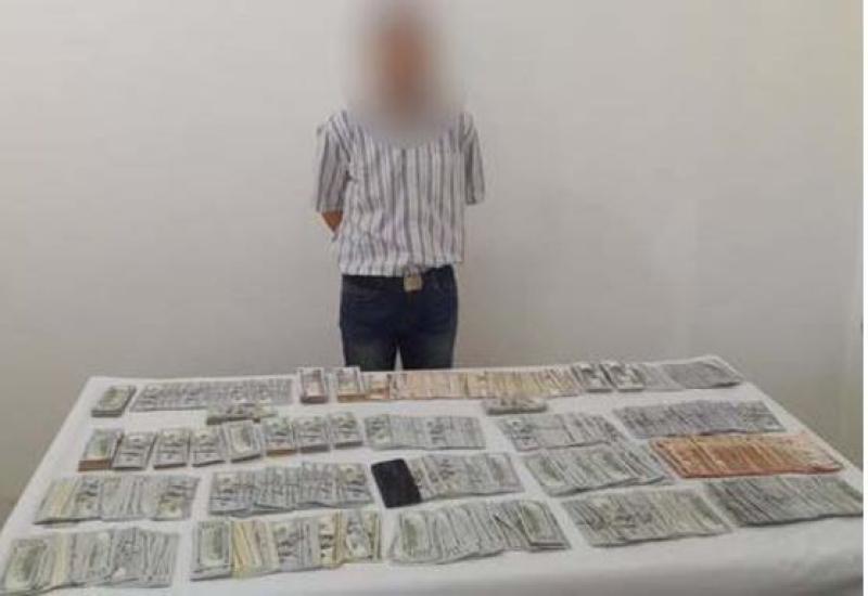 ضبط متهم بالإتجار في النقد الأجنبي المشبوه بالقاهرة
