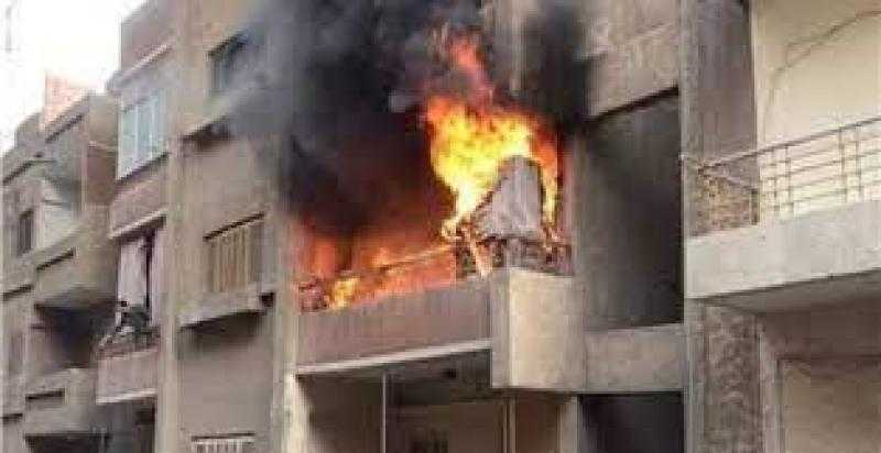 محاولات لإخماد حريق في مبنى الشهر العقاري بالدقي
