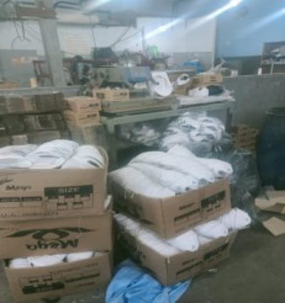 ضبط مصنع للأحذية المغشوشة في القاهرة