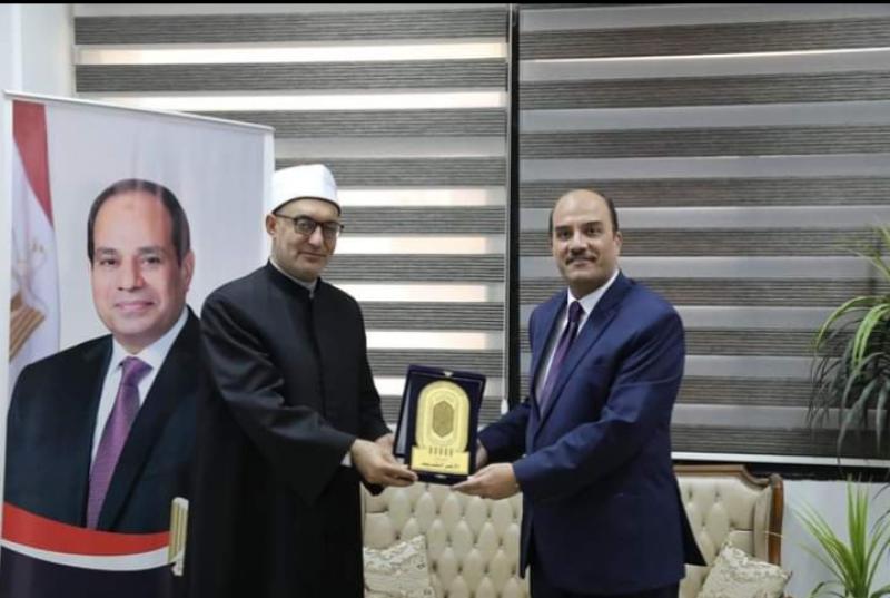 الدكتور نظير عياد ورئيس جامعة العريش
