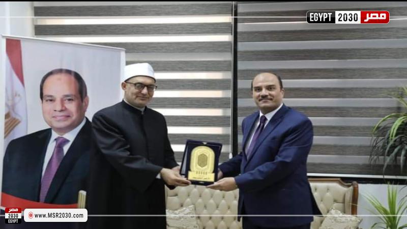 الدكتور نظير عياد ورئيس جامعة العريش