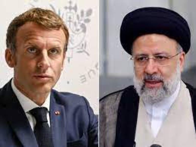 ماكرون والرئيس الإيراني 