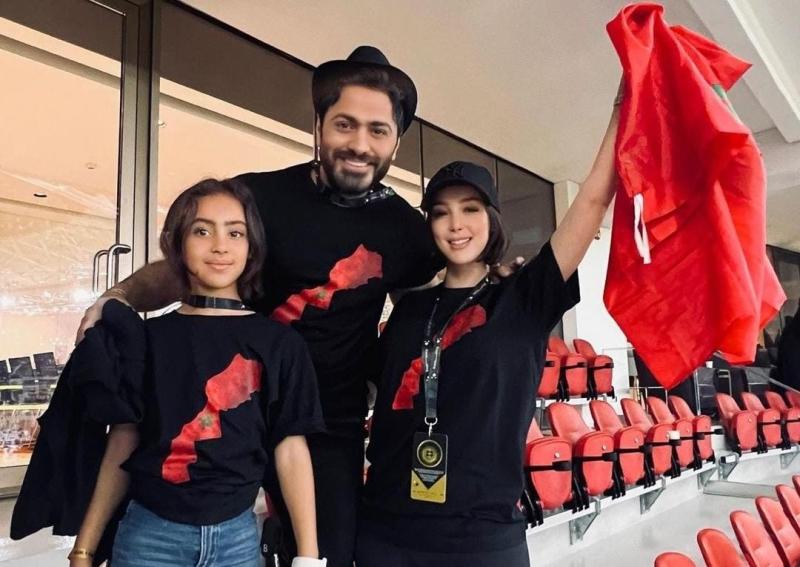 مع زوجته من داخل المدرجات.. تامر حسني يحتفل بفوز المغرب على البرتغال