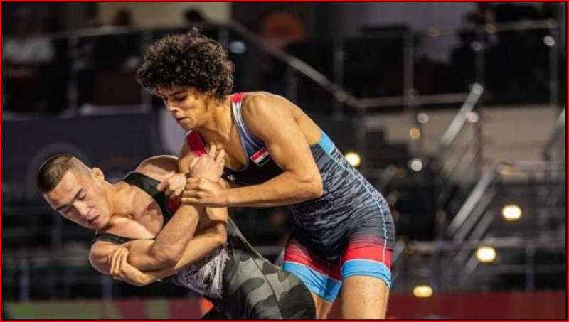 «الوطنية للتدريب» تقدم منحة تأهيل ورعاية للمصارع أحمد بغدودة