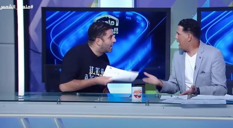 أمير عزمي ومدرب الأولمبي