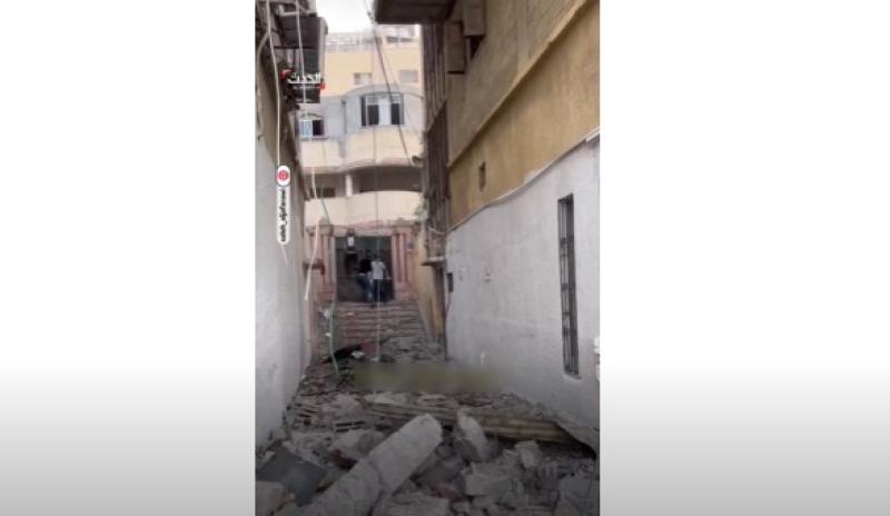 صراخ بين أهالي غزة بعد قصف برج الكرمل بجوار مستشفى الشفاء.. «فيديو»
