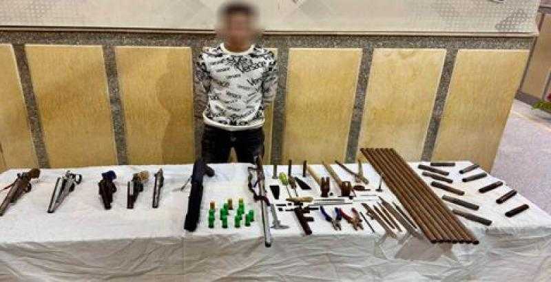 حبس ميكانيكى وعاطل بحوزتهما 21 قطعة سلاح بالفيوم وأسيوط
