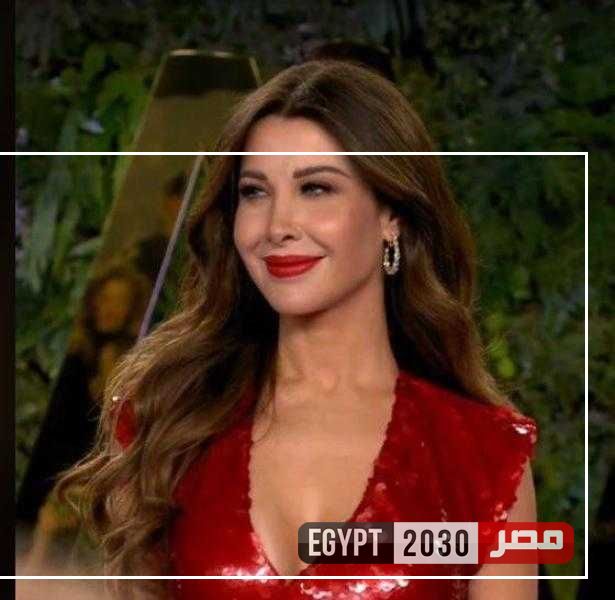 نانسي عجرم بفستان أحمر في حفل joy awards بالسعودية