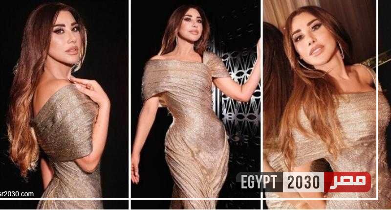 صغرت 20 سنة.. نجوى كرم تتألق بفستان ذهبي وذيل طويل