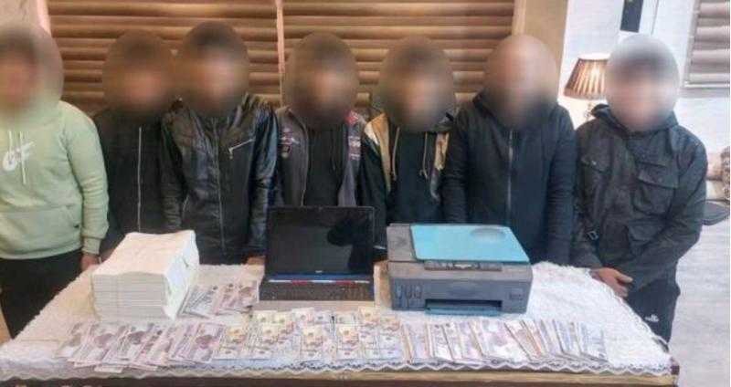 ضبط عصابة لتزييف الدولارات في القليوبية