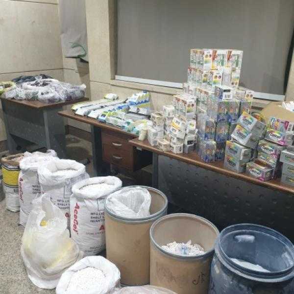 ضبط مصنع لتصنيع العقاقير المخدرة في مدينة نصر .. صور