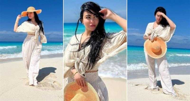 ميرهان حسين في جلسة تصوير جديدة على البحر