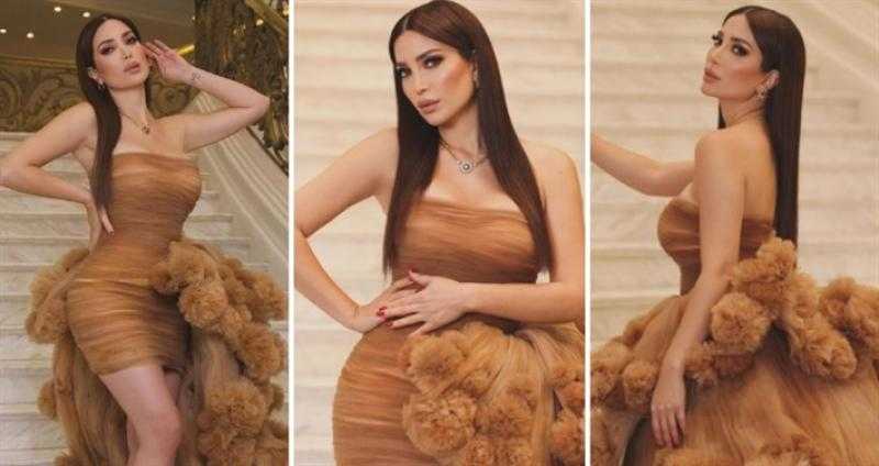 نسرين طافش بفستان من التول قصير وبذيل طويل