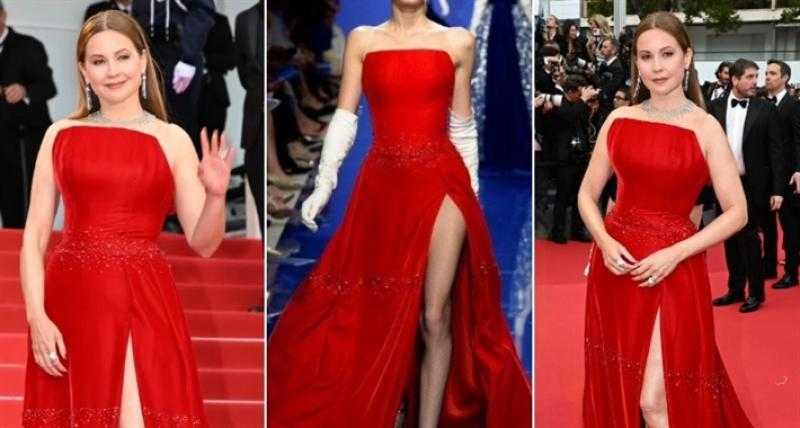 ريا أبي راشد بفستان أحمر مكشوف الساق بمهرجان كان السينمائي