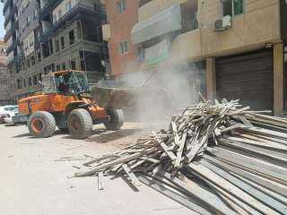 تنفيذ حملة لإزالة الإشغالات والتعديات في  حي ثالث مدينة الإسماعيلية