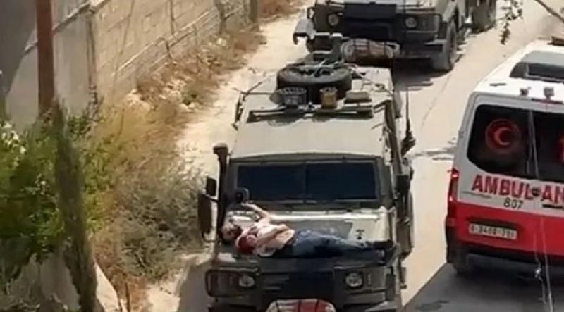 وصف صارم من واشنطن على تقييد فلسطيني بمقدمة سيارة عسكرية إسرائيلية