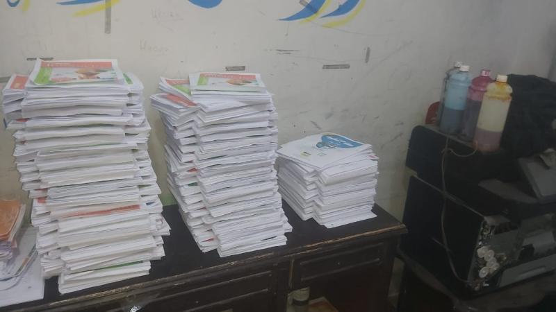 ضبط مركز تعليمى بالجيزة لنسخ الكتب الدراسية بدون تفويض 
