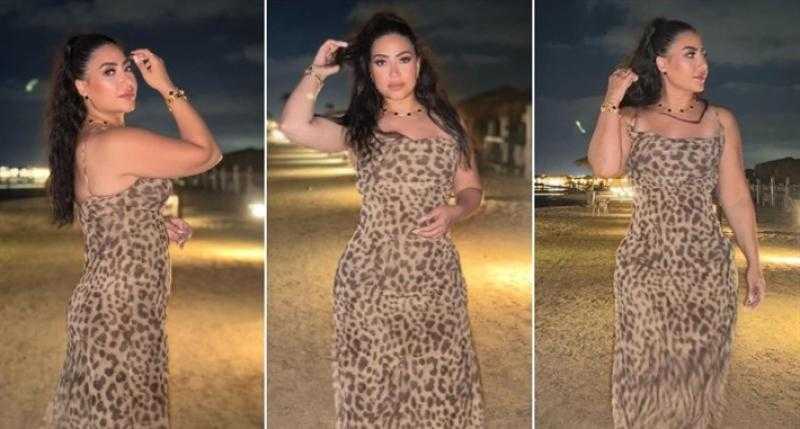 بوسي بفستان بطباعة Leopard يظهر رشاقتها