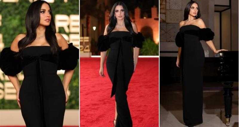 سعره 370 ألف جنيه..درة بفستان أسود بأكمام منتفخة من المخمل