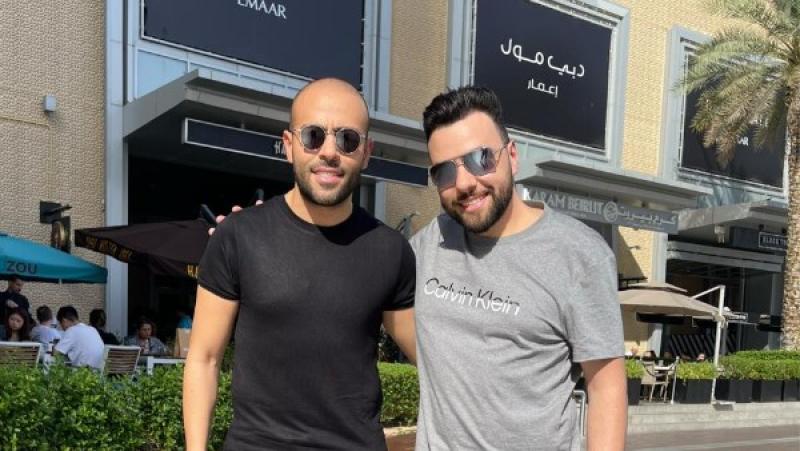 تامر عاشور  والملحن مدين