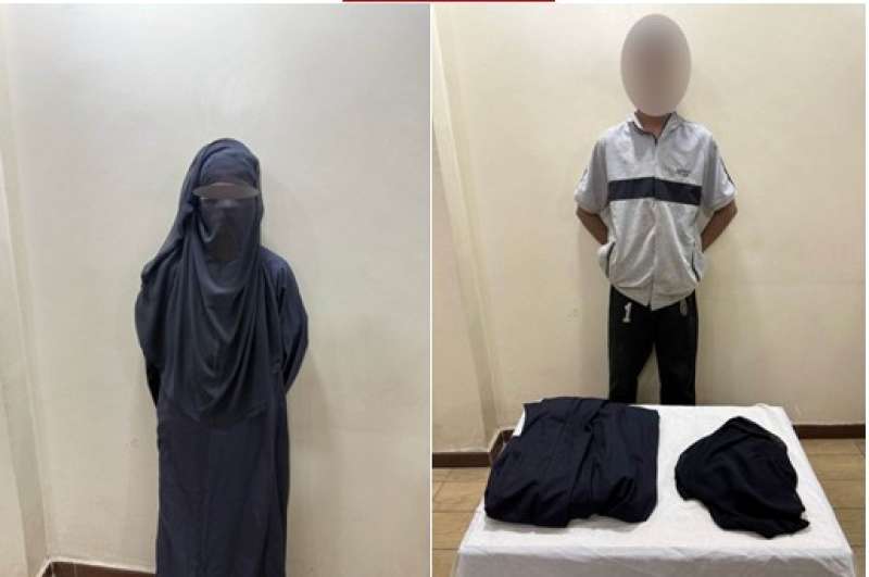 ضبط  طالب يرتدى نقاب 