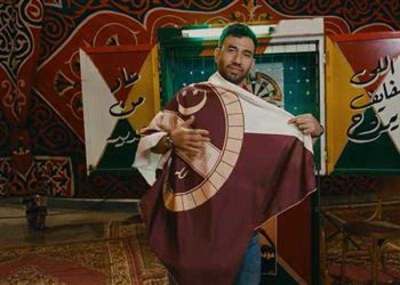 تريزيجيه يظهر بقميص الأهلي: ”الحكاية مستمرة في بيتي”