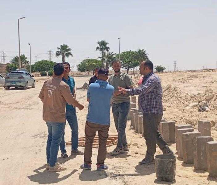 جهاز مدينة 15 مايو يواصل أعمال رفع كفاءة طرق المرحلة الثالثة