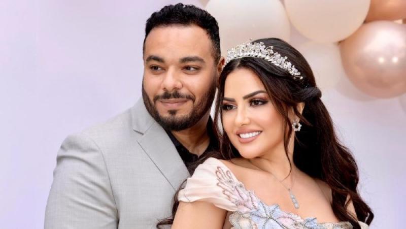 إيمان عبد الغني وزوجها