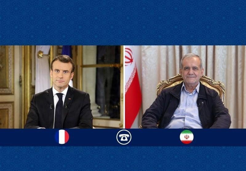 الرئيس الإيراني ونظيره الفرنسي 