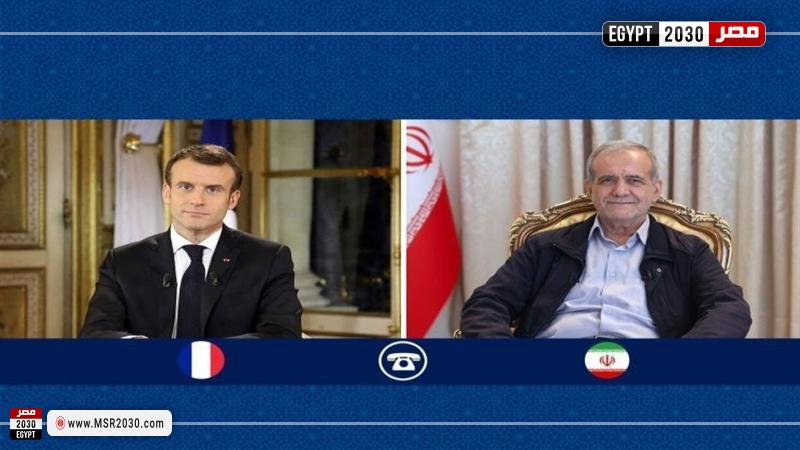 الرئيس الإيراني ونظيره الفرنسي 