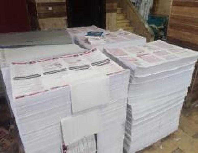 ضبط مطبعة غير مرخصة بالجيزة وبحوزتها 54 ألف نسخة كتاب وملازم مخالفة