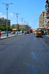 قرب الانتهاء من أعمال رصف وتطوير شارع العبور بدءًا من نهضة مصر حتى مديرية الإسكان ببورسعيد