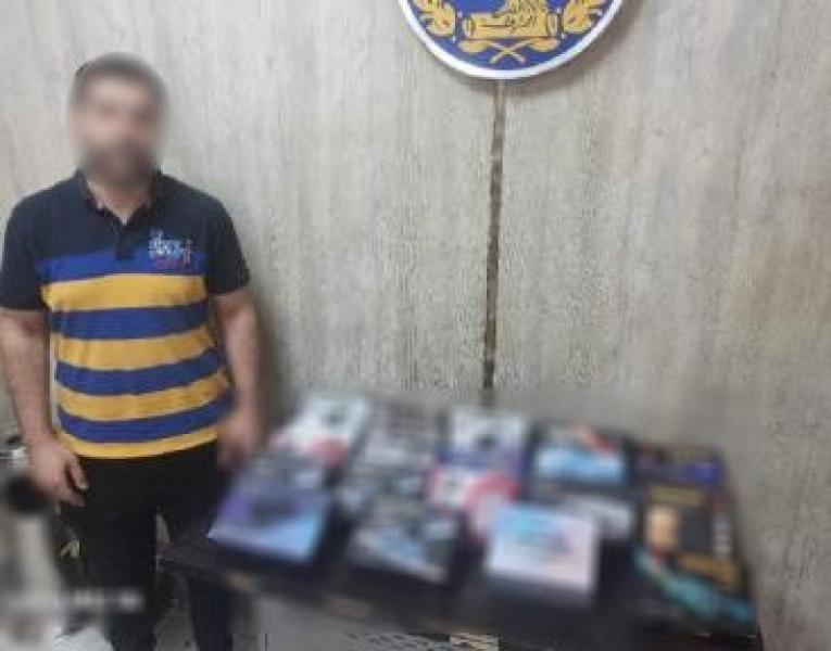 ضبط محل غير مرخص لبيع أجهزة فك الشفرات بالجيزة