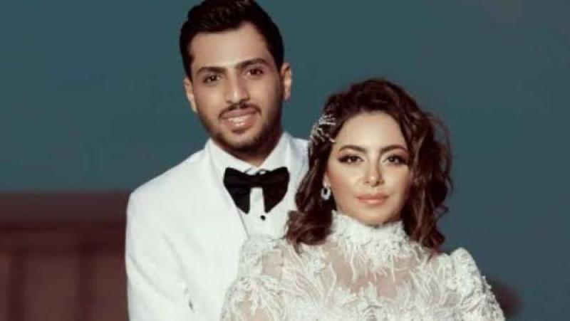 إلهام عبد البديع وزوجها 