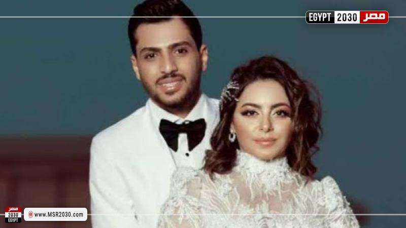 إلهام عبد البديع وزوجها 