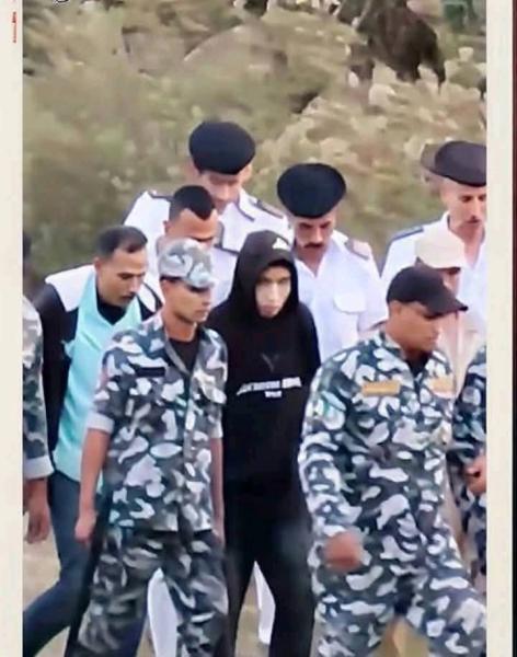 المتهم وسط حراسة مشددة