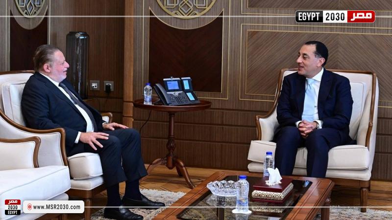 الدكتور مصطفى مدبولي، رئيس مجلس الوزراء، وحسن عبدالله، محافظ البنك المركزي