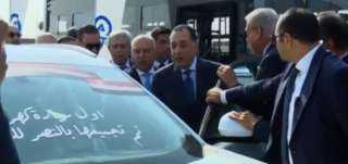 مدبولي يشهد تجربة أول سيارة كهربائية تم تجميعها... مدبولي يشهد تجربة أول سيارة كهربائية تم تجميعها في مصر