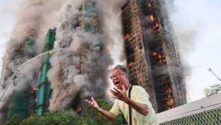 ارتفاع ضحايا حريق ضخم في هونج كونج إلى 55 قتيلاً وإصابة 123 آخرين