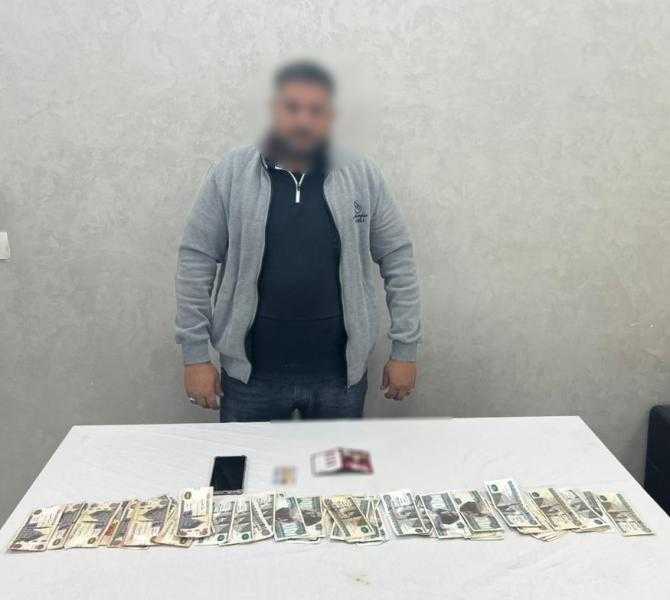 ضبط عامل بالبحيرة متلبساً بتوزيع رشاوى انتخابية