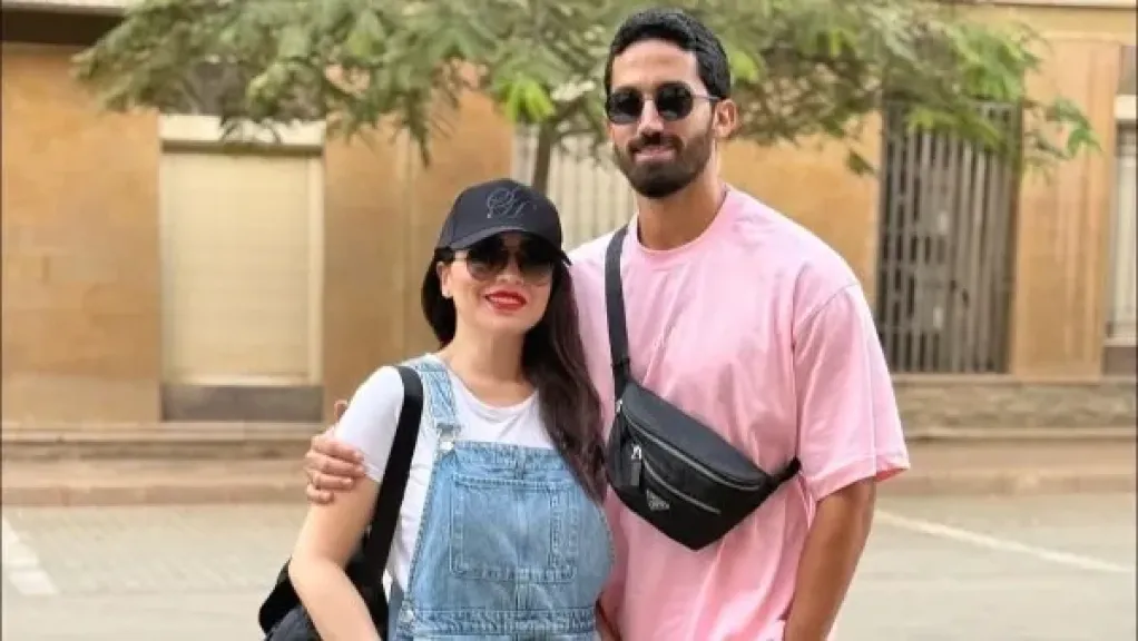 أحمد تيمور ومي عز الدين 