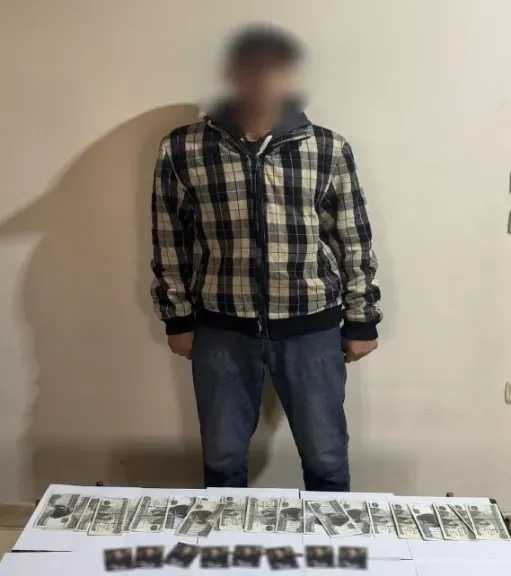 ضبط شخص لتوزيع أموال وكروت دعائية على الناخبين بأجا