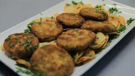 طريقة عمل كفتة الكوسة بالدجاج