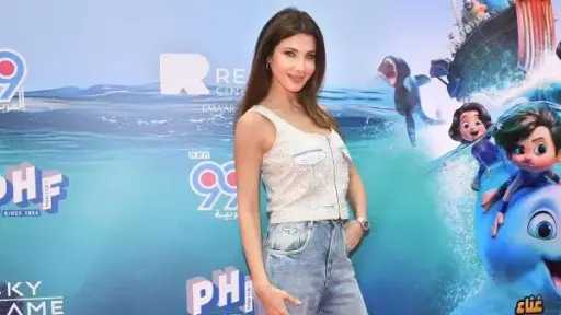 نانسي عجرم تخطف الأنظار في العرض الأول لفيلم «بطل الدلافين» بدبي